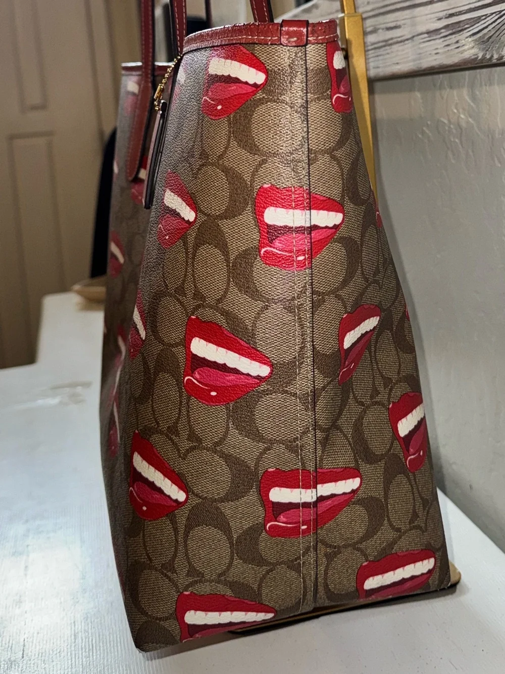 Coach x Tom Wesselman 2023 City Tote signature khaki w red smile mouth lips
